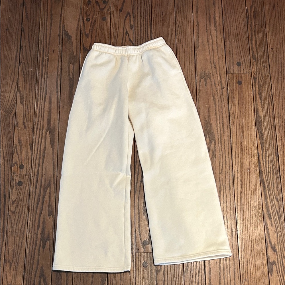 Edikted Butter Yellow Wide Leg Sweatpants with Pink Bows on Back